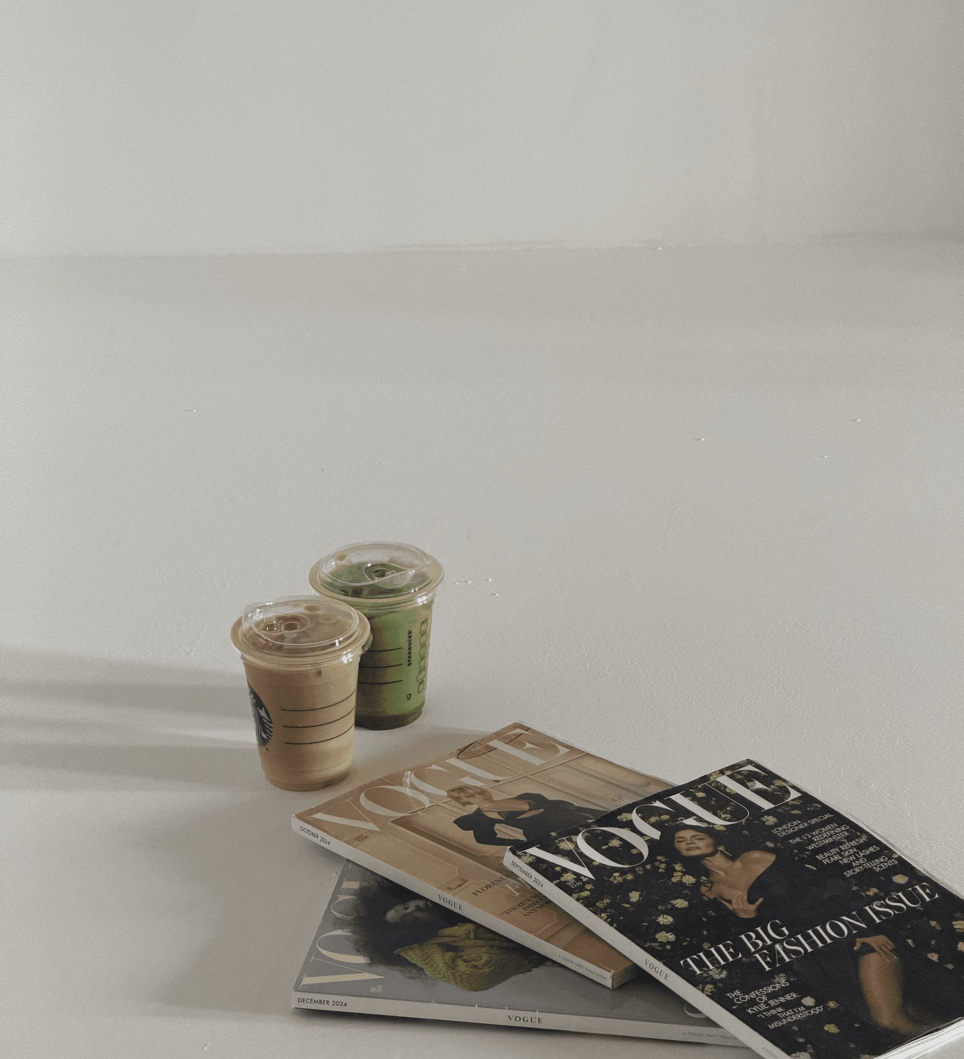 Vogue issues and iced drinks styled for a content shoot